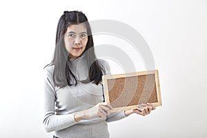 Woman having cork board white background