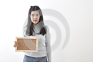 Woman having cork board white background