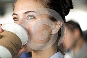 Woman having a cup of hot coffee