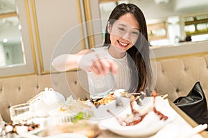 Woman having dinner in chinese resturant