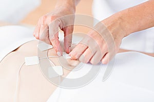 Woman having electrotherapy
