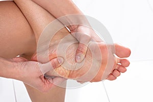 Woman Having Feet Massage