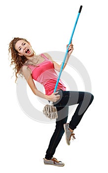 Woman having fun by playing air guitar