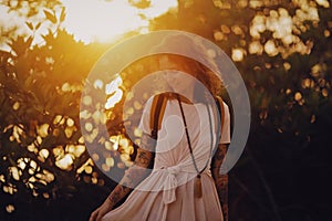 A woman having goodtime in sunset light photo