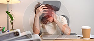 Woman having headache, stress and Migraine during work long time on workplace, stressed Asian Woman using laptop, Tired female