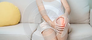 woman having knee ache and muscle pain due to Runners Knee or Patellofemoral Pain Syndrome, osteoarthritis, arthritis, rheumatism