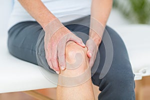 Woman having knee pain