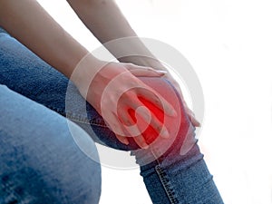 Woman having knee pain in medical office. Breaks and sprains Unrecognizable isolated on white background, health care