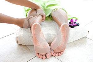 Woman having leg massage