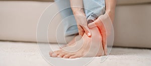 woman having leg pain due to Ankle Sprains or Achilles Tendonitis and Shin Splints ache. injuries, health and medical concept