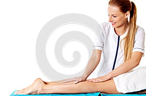 Woman having massage of body in the spa salon. Beauty treatment concept.