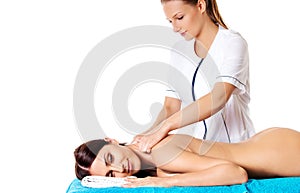 Woman having massage of body in the spa salon. Beauty treatment concept.