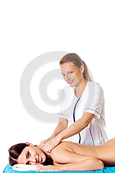 Woman having massage of body in the spa salon. Beauty treatment concept.