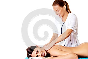 Woman having massage of body in the spa salon. Beauty treatment concept.