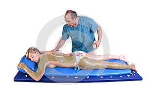 Woman having Massge and seaweed body treatment