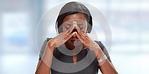 Woman having a migraine headache. photo