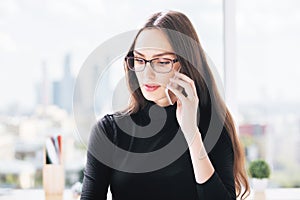 Woman having mobile phone conversation