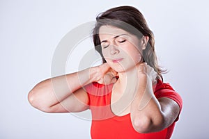Woman having neck pain