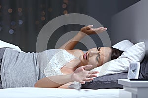 Woman having a nightmare in the night photo