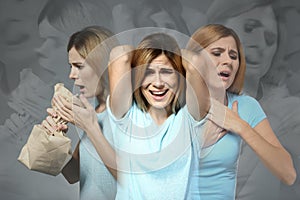 Woman having panic attack on grey background