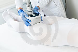 Woman having procedure of lipomassage