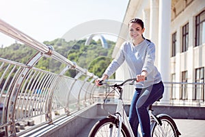 Woman having a rest on bike