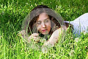 Woman having rest on meadow