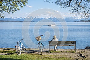 Woman having a rest at Starnberg lake