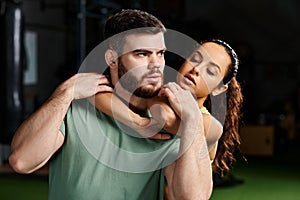 A woman having self-defense training