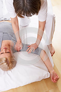 Woman having Shiatsu massage