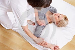 Woman having Shiatsu massage