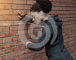 Woman having a short break from running