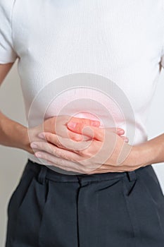 Woman having Stomach pain. Ovarian and Cervical cancer, Cervix disorder, Endometriosis, Hysterectomy, Uterine fibroids,