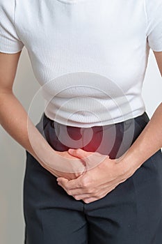 Woman having Stomach pain. Ovarian and Cervical cancer, Cervix disorder, Endometriosis, Hysterectomy, Uterine fibroids,
