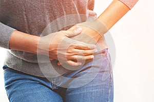 Woman having a stomachache, or menstruation pain.