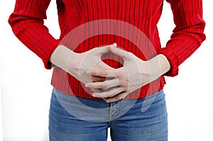 Woman having a stomachache, or menstruation pain. Teenage girl with stomach issues. Child in pain.