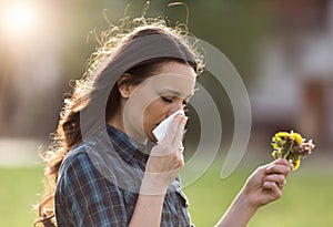 Woman having symptoms of spring pollen allergy