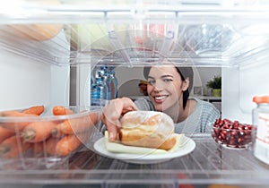 Woman having an unhealthy snack