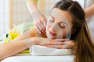 Woman having a wellness back massage