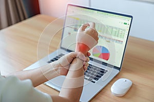 Woman having wrist pain when using mouse during working long time on workplace. De Quervain s tenosynovitis, ergonomic, Carpal