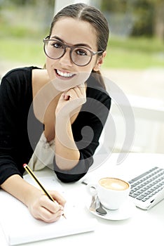 Woman with head tilted up smiling