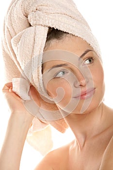 Woman with head wrapped towel