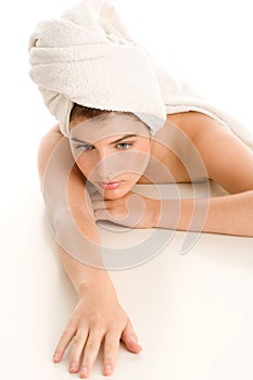 Woman with head wrapped towel