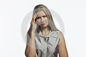 Woman with headache, horizontal