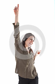 Woman with headphones listening and enjoing music. Girl with headphones dancing.