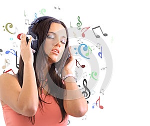 Woman with headphones listening mus