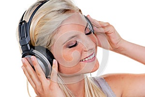 Woman with headphones listening to music