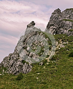 A Girl sit on the Rock