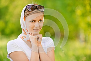 Woman in headscarf with sunshades