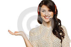 Woman in headset holding empty copy space on her open palm